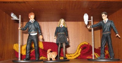 Gryffindor scarf made by me
Harry, Ron , Hermione and Pets Action Figures

