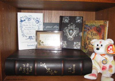 JK Rowlings Autograph!
Beedle the Bard Collectors Edition
Beedle the Bard Normal Edition
Beedle the Bard Auction Book
What's Your Story Postcard Book
Color Me Beanie Baby that I colored as a Gryffindor :)
