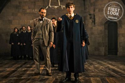young-newt-scamander-and-young-dumbledore-in-class-with-boggart.jpg